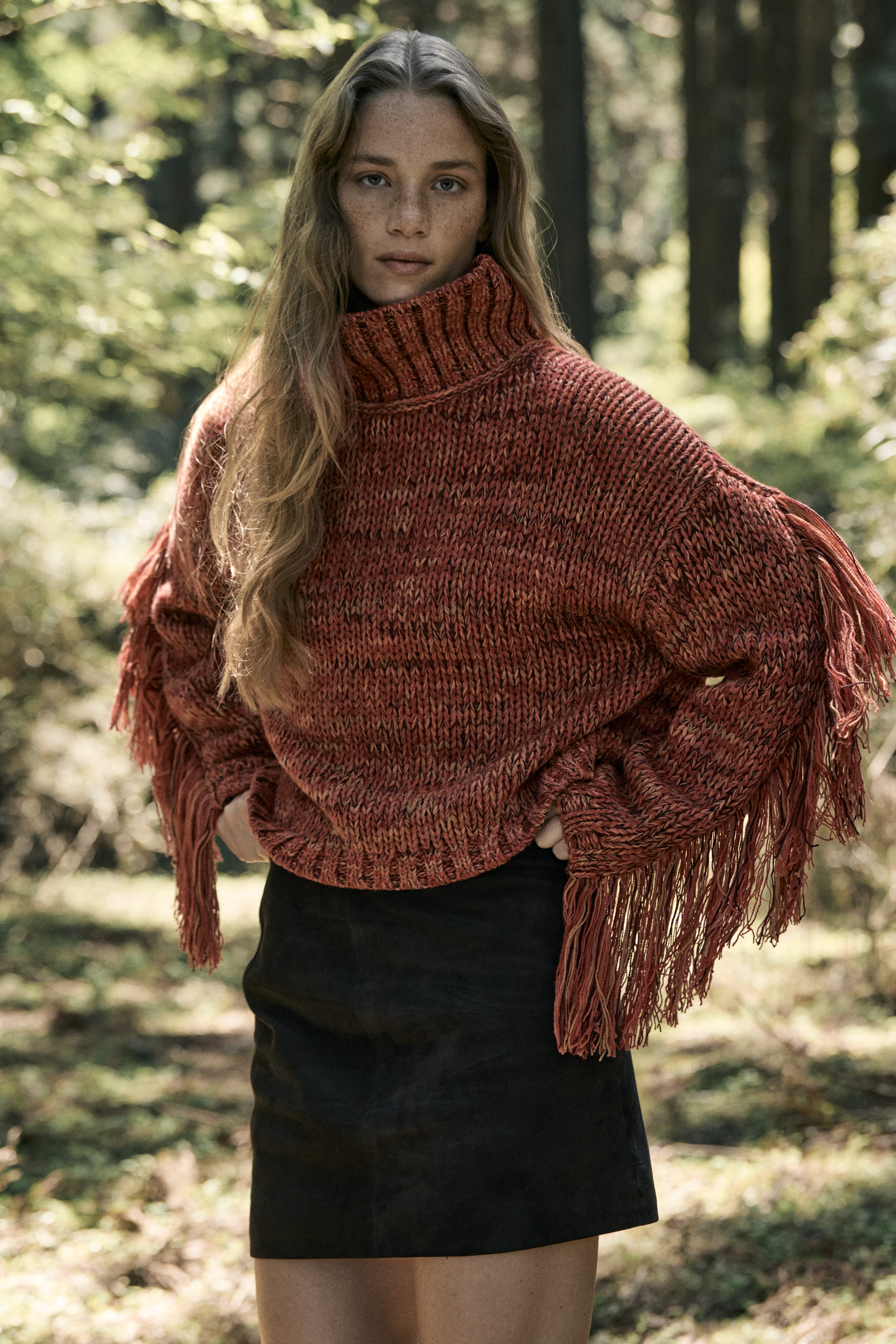 SWEATERS